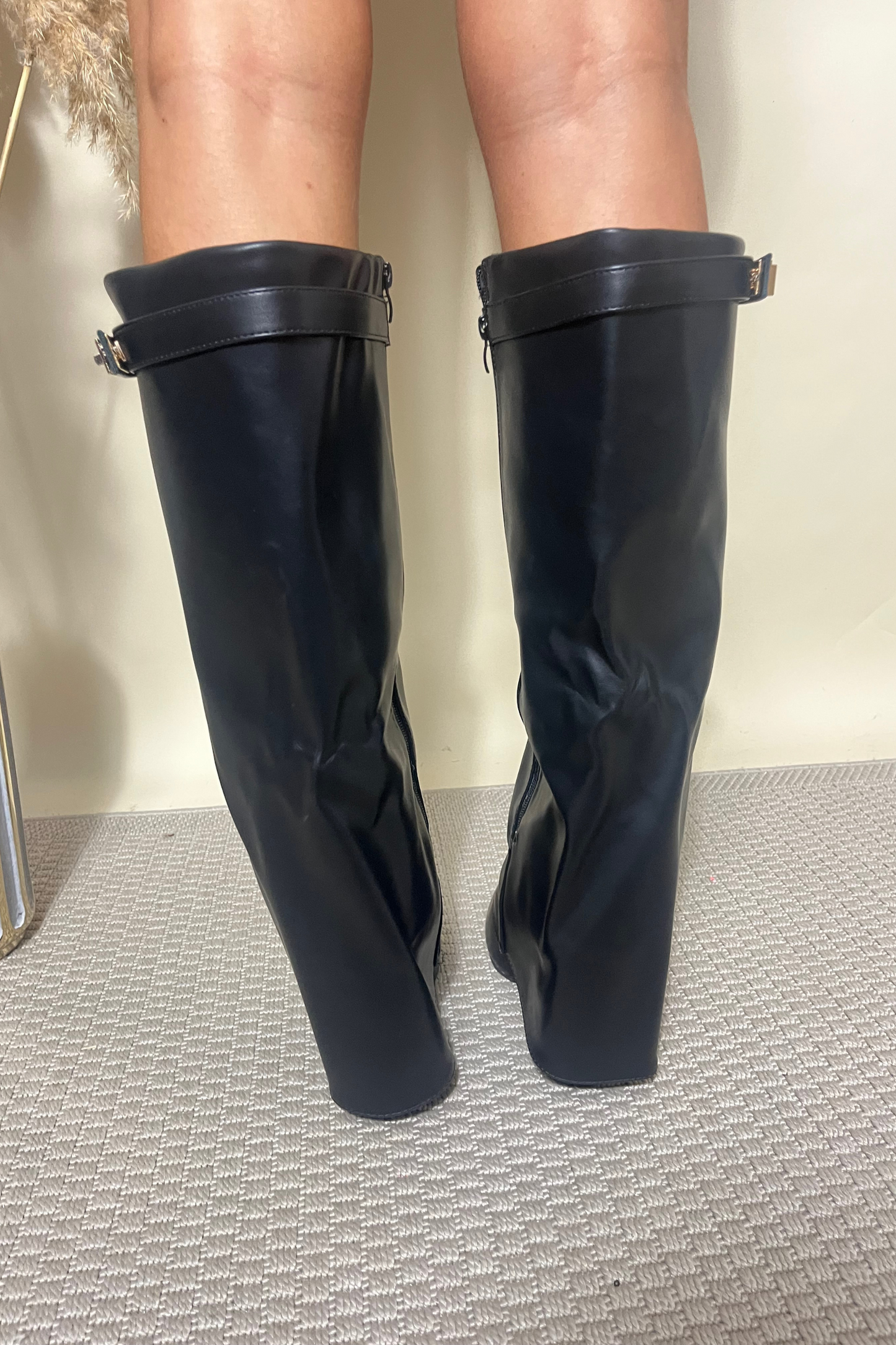 Black flap over heeled boots