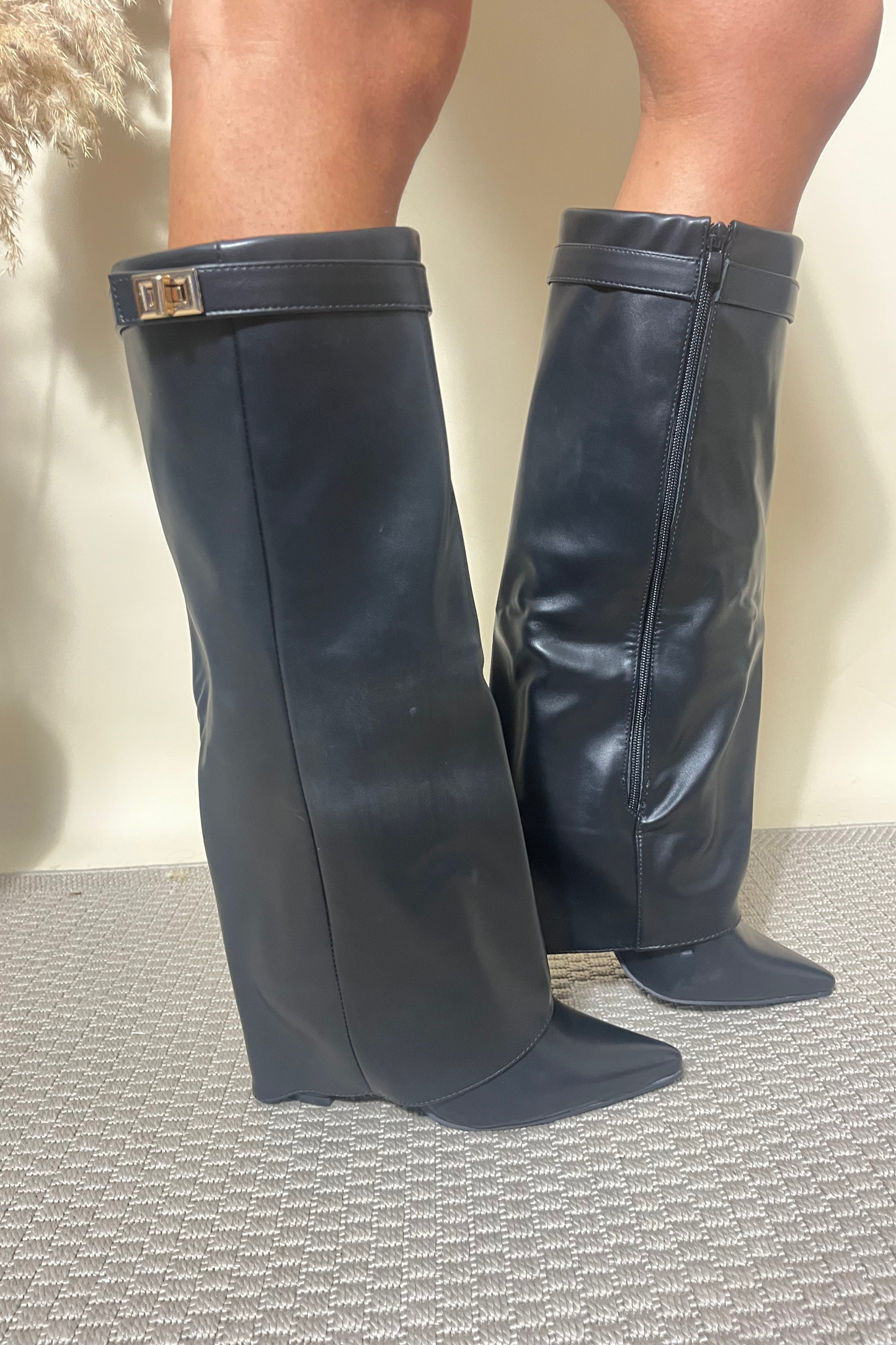 Black flap over heeled boots