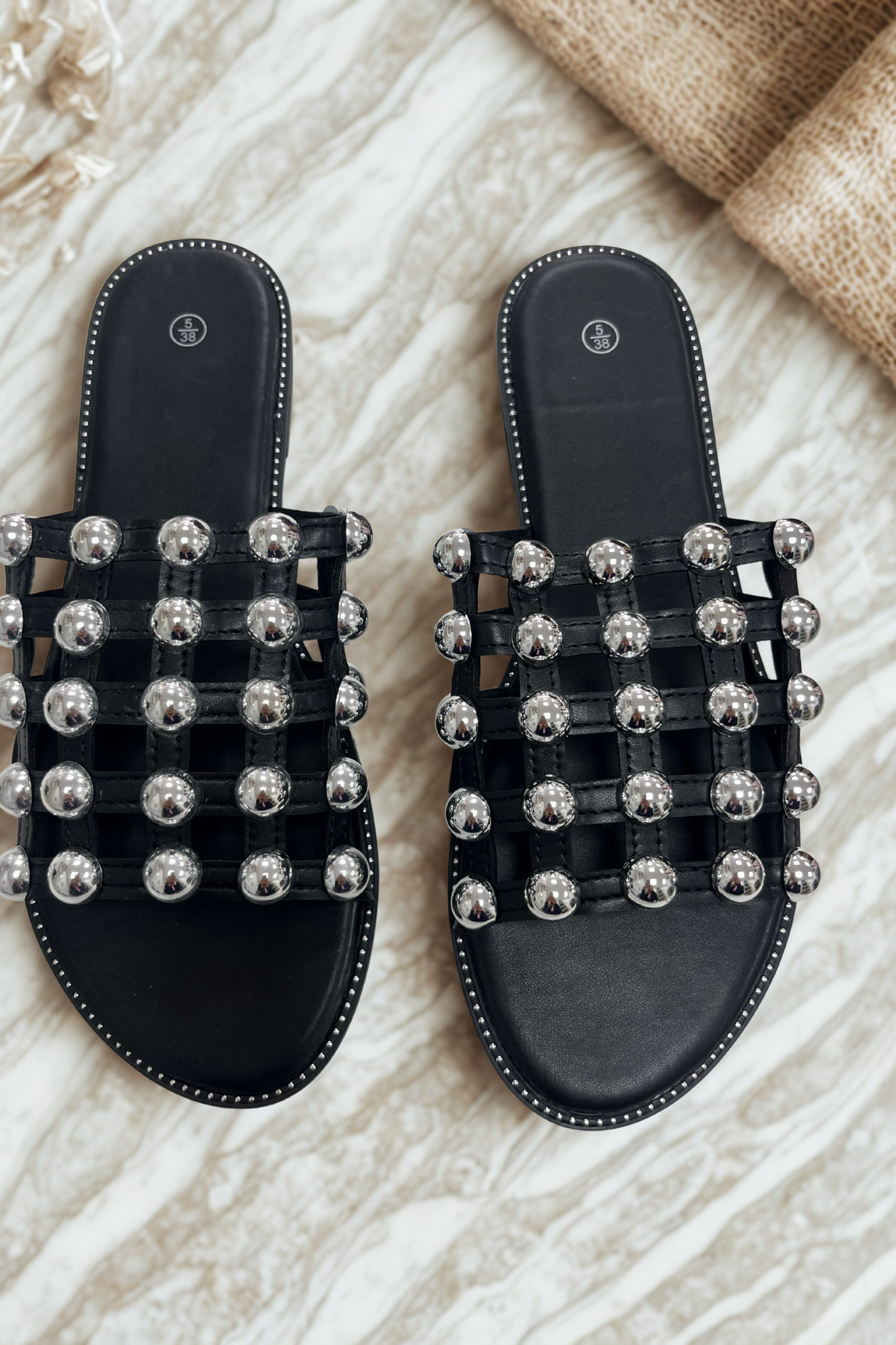 Black studded slip on sandals