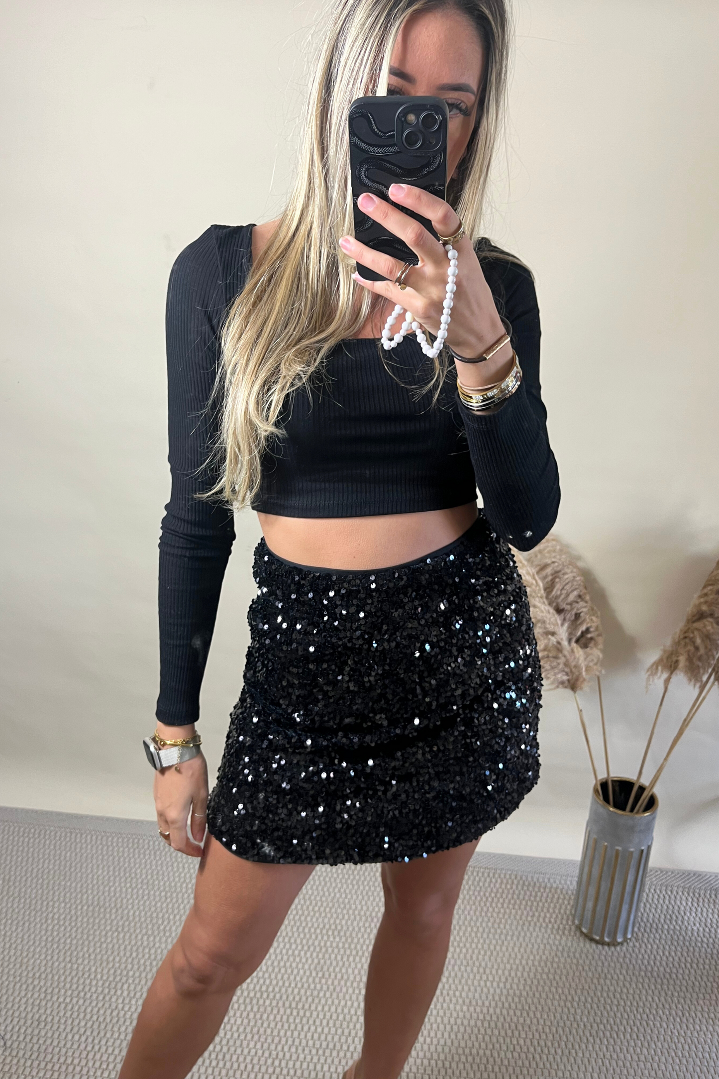 Black sequin mini skirt