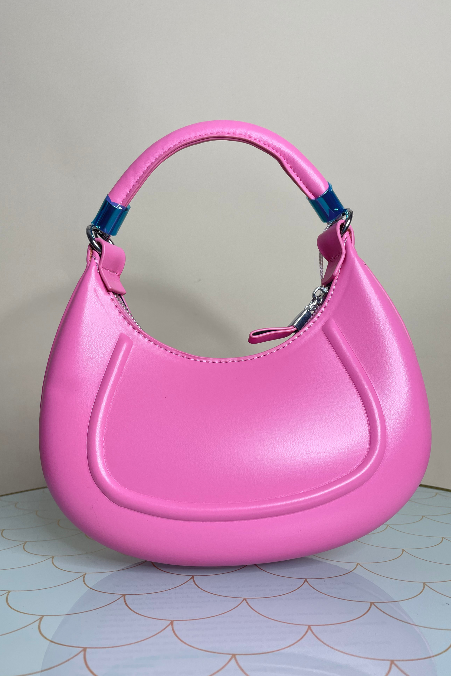 Pink top handle bag with chain