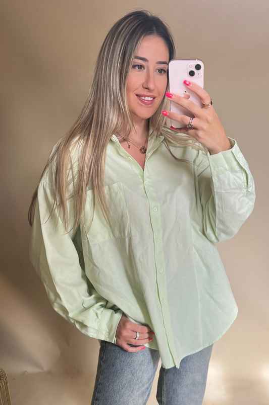 Pastel green long sleeved button up shirt