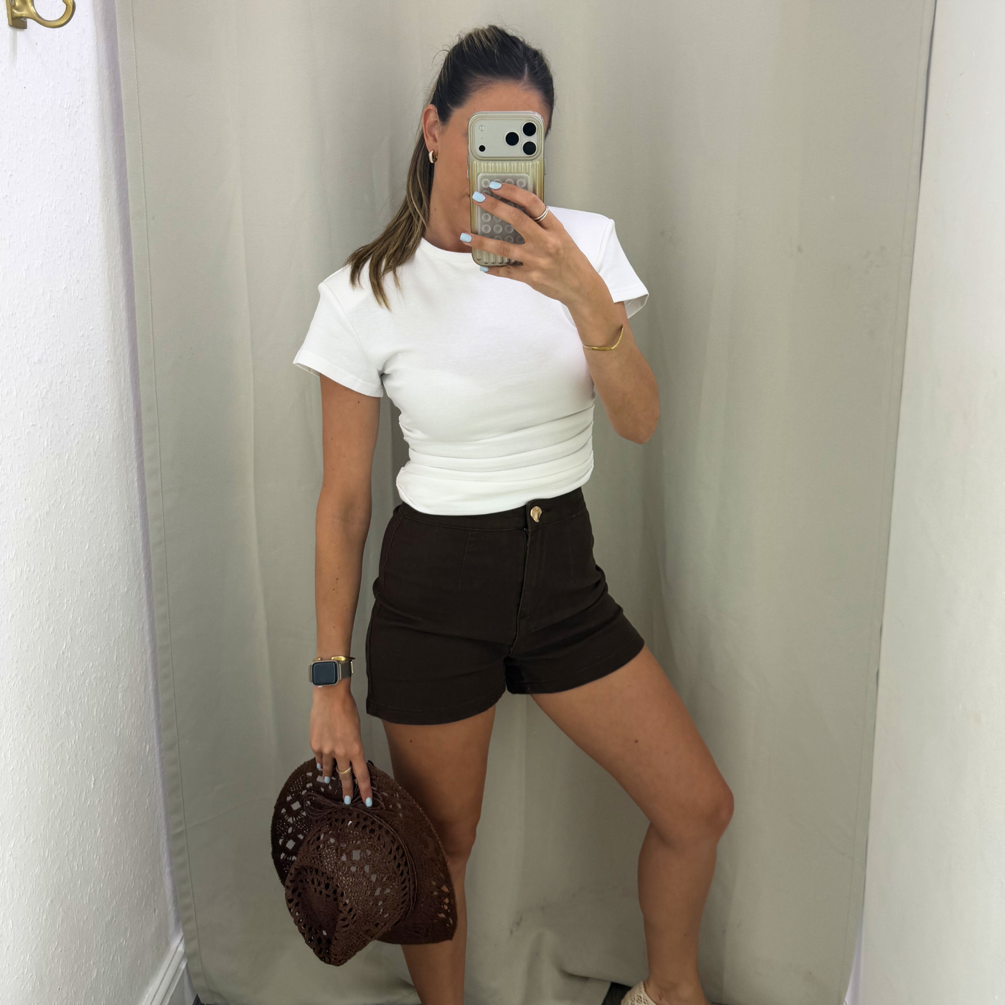 White shoulder padded top