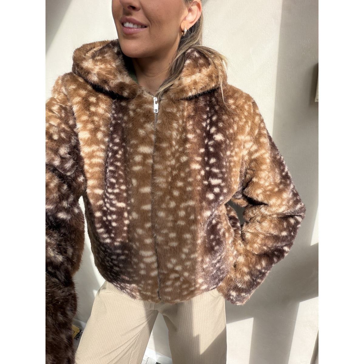 Brown hooded deer print faux fur jacket worn by Selene